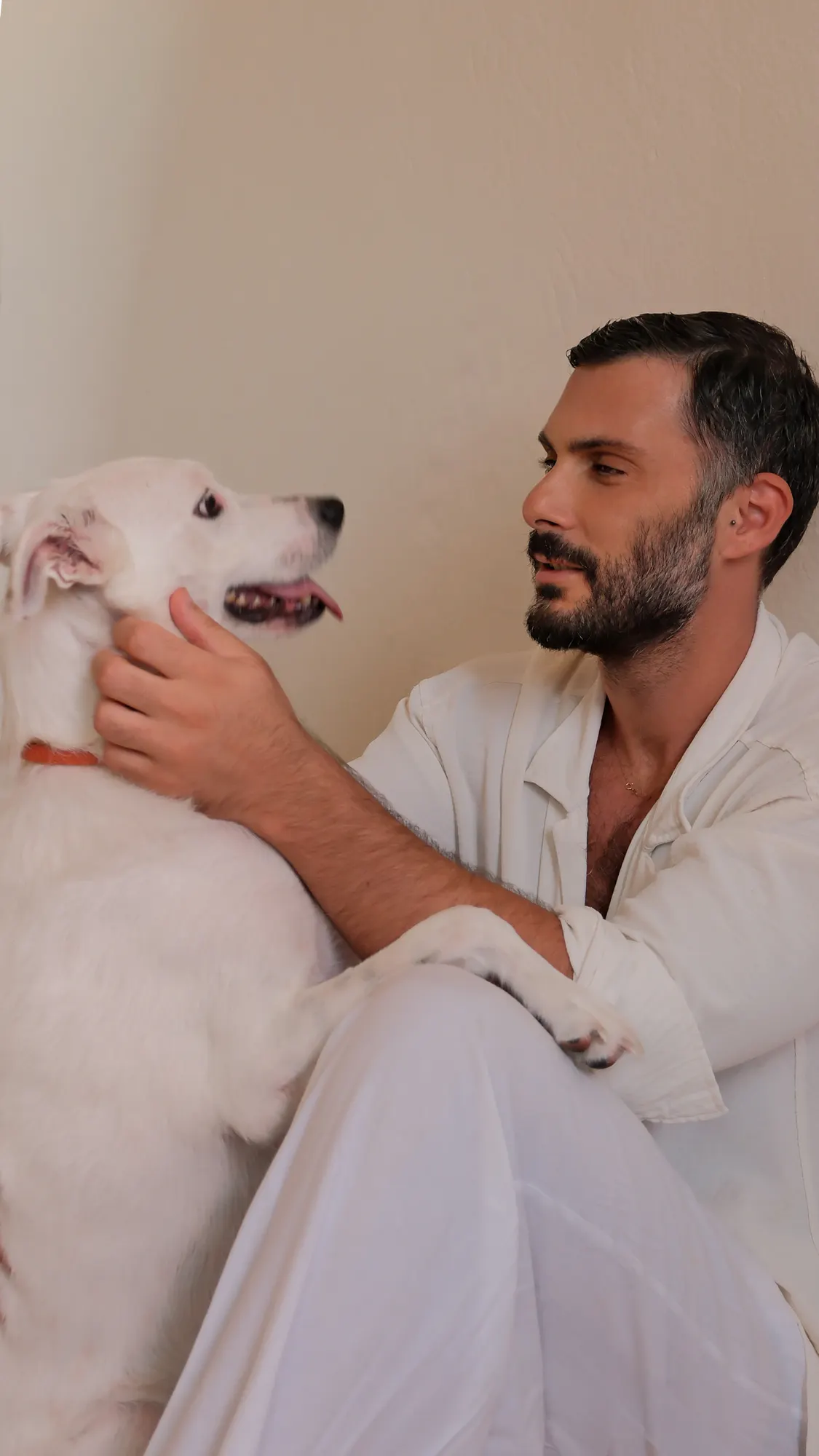 Tarik Gül spending time with his dog away from the fashion spotlight.